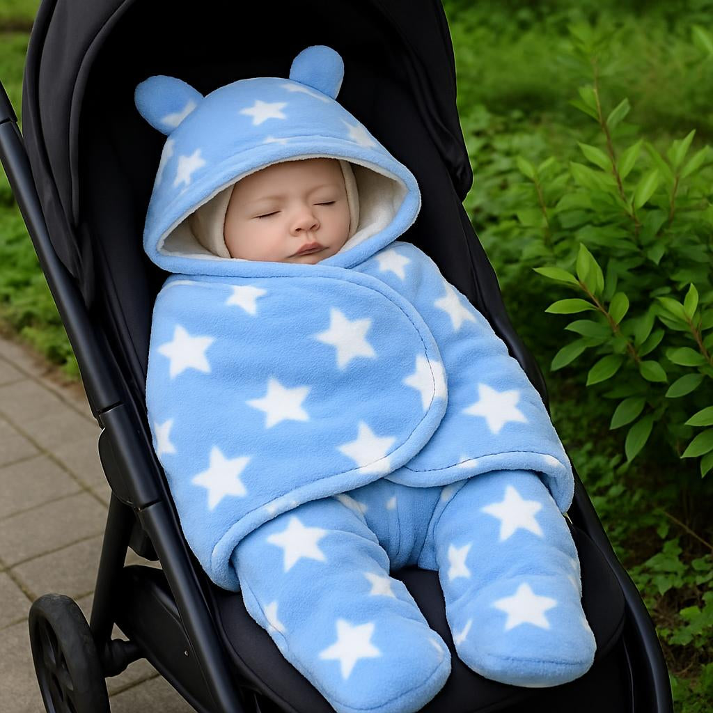 An outdoor setting with a baby comfortably wearing the blanket in a stroller, surrounded by greenery, showcasing all-season use.